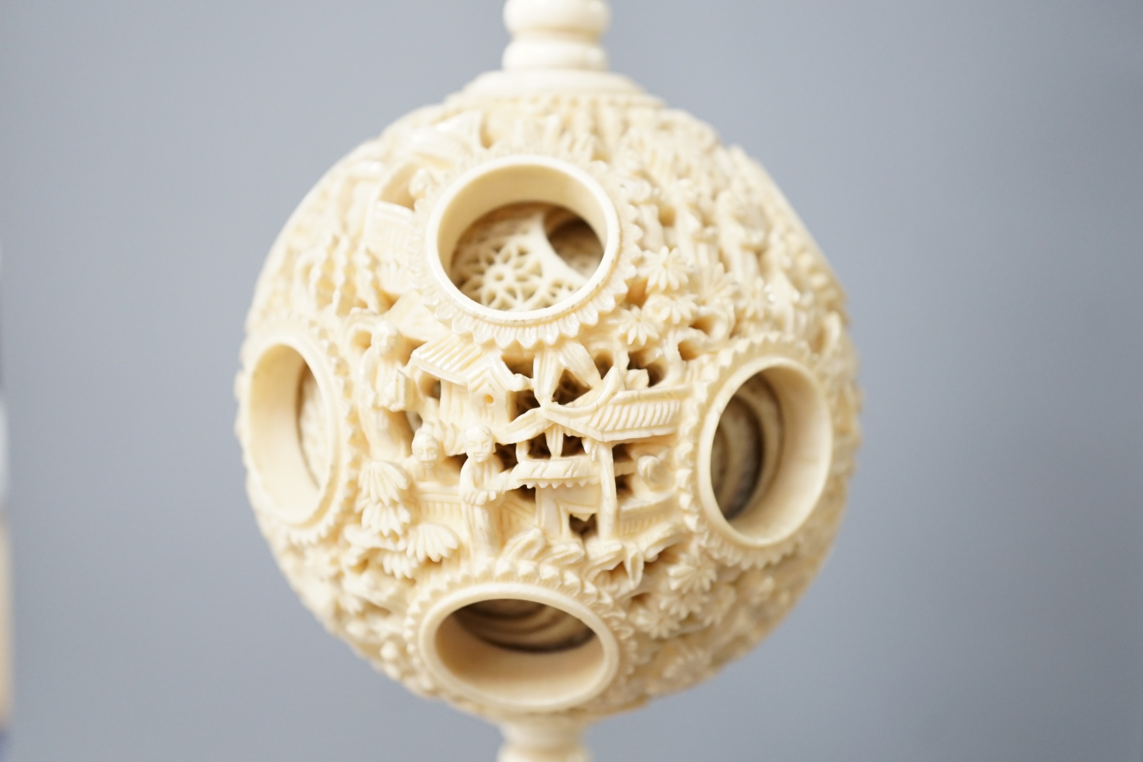 A boxed 19th century Chinese ivory concentric puzzle ball 41cm